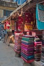 Pashmina, woolen plaids, silk scarfs and weightless pareo on asian market