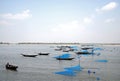 Pashur River near Mongla in Bangladesh. Fishing boats with nets on the river between the Sundarban Forest and Khulna