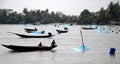 Pashur River near Mongla in Bangladesh. Fishing boats with nets on the river between the Sundarban Forest and Khulna