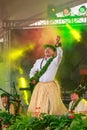 Male Hawaiian dancer in grass skirt performing at Pasifika Festival, Auckland, New Zealand Royalty Free Stock Photo