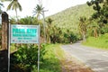 Pasil reef marine sanctuary sign and road in Camiguin, Philippines