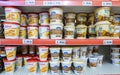 Supermarket shelves with a variety of dulce de leche of different brands - Argentina