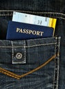 Pasport with boarding pass in jeans