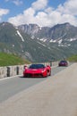 Two red Ferrari take part in the CAVALCADE 2018 event along the roads of Italy, France and Switzerland around MONTE BIANCO