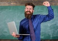 Pass test online. Distance education concept. Teacher bearded man with modern laptop passed test online chalkboard