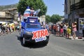 Passage of an advertising car of X.TRA total in the caravan of the Tour de France