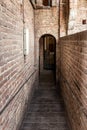 The passage in the fortress wall in the inner courtyard of the Sforzesco Castle - Castello Sforzesco in Milan, Italy Royalty Free Stock Photo