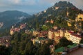 Radisson Jass Shimla and other buildings at sunset