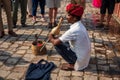 A snake charmer and his Cobra snake