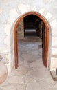 Passage or low door to the old basement. Royalty Free Stock Photo