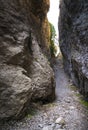 The passage between the rocks in the canyon crevice