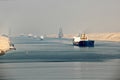 Passage through the Suez Canal by large sea vessels. Royalty Free Stock Photo