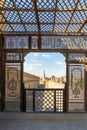 Passage surrounding Ibn Tulun Mosque framed by wooden perforated wall - Mashrabiya - Cairo, Egypt Royalty Free Stock Photo
