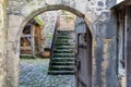 Passage to courtyard in medieval city Honfleur in Normandy, France Royalty Free Stock Photo