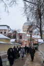 Russia, St. Petersburg, January 2022. People at the entrance to the Alexander Nevsky Lavra complex.