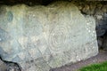 Massive stone with prehistoric petroglyphs