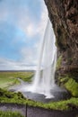 Passage under the waterfall