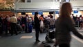 Passangers long line up for waiting check in counter at YVR airport