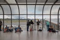 Passangers waiting in the airport terminal building