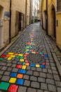 Vertical view the colorful cobblestones in the HÃllgasse Artists Alley Royalty Free Stock Photo