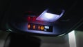 Passenger airbag status warning light on display of a car console. Royalty Free Stock Photo