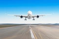 Passenger aircraft with on the asphalt landing on a runway airport, motion blur. Royalty Free Stock Photo