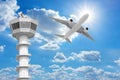Passenger aircraft flying above air traffic control tower agai
