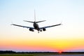 Passenger aircraft landing approach to the airport. Airplane flight in the sky Royalty Free Stock Photo