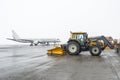 Passenger aircraft loading of baggage into the cargo bay at the airport. Royalty Free Stock Photo