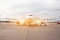 Passenger aircraft, waiting for the passengers to board at the airport terminal Royalty Free Stock Photo