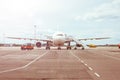 Passenger aircraft, waiting for the passengers to board at the airport terminal Royalty Free Stock Photo