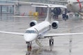 Passenger aircraft, waiting for the passengers to board at the airport terminal Royalty Free Stock Photo