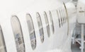 Passenger aircraft windows. Royalty Free Stock Photo