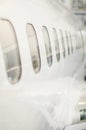 Passenger aircraft windows. Royalty Free Stock Photo