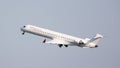 Passenger airliner operated by Iberia Regional taking off into sky Royalty Free Stock Photo