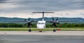 Passenger airplane Bombardier Q400 NextGen of Aurora company just landed Royalty Free Stock Photo