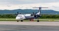 Passenger airplane Bombardier Q400 NextGen of Aurora company just landed Royalty Free Stock Photo