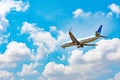 Passenger airplane flying above clouds