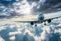 Passenger airplane flying above clouds. View from the window plane to amazing sky with beautiful clouds. Royalty Free Stock Photo