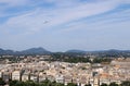 Passenger airplane flying over Corfu town Royalty Free Stock Photo