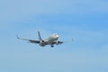 Passenger airplane landing at the airport