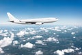 Passenger airplane landing at in good clear weather with a blue sky clouds on a runway