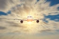 Passenger airplane motion blur, business trip, travel concept. Flying evening sunset Royalty Free Stock Photo