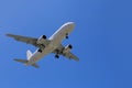 Passenger Airplane Taking Off Into The Blue Sky Royalty Free Stock Photo