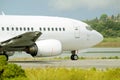 Passenger airplane waiting for takeoff clearance on the runway Royalty Free Stock Photo