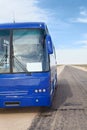 Passenger blue bus on the roadside Royalty Free Stock Photo
