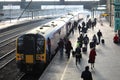 Passenger boarding electric train at Carlisle