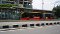 Passenger buses arrive at the bus stop on Letjend Suprapto street. Cempaka Mas, East Jakarta.