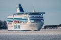 Passenger car ferry MV Silja Serenade, operated by Silja Line, passing the strait of Kustaanmiekka on clear winter morning