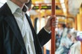 passenger commuter in public transport, commuting people in bus or tram, close up of hand Royalty Free Stock Photo